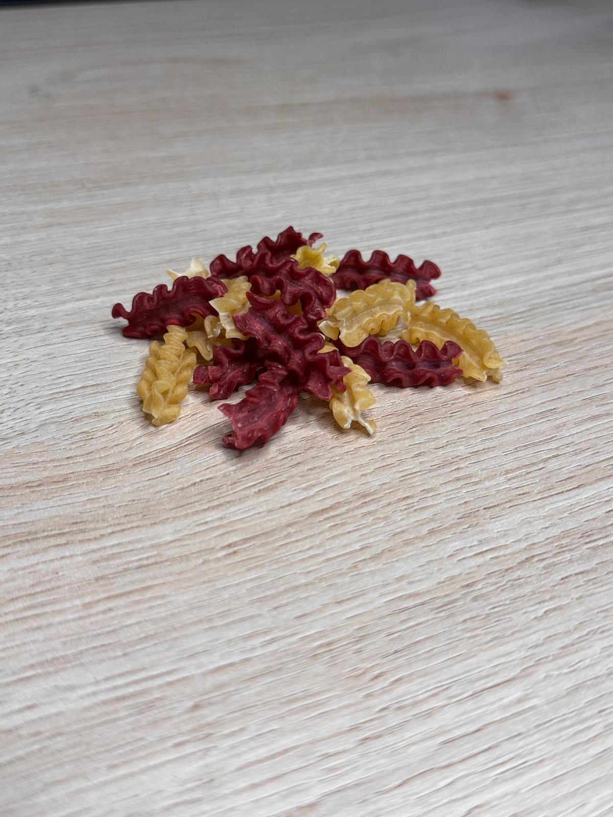 Tripolino Nudel Rot/Natur